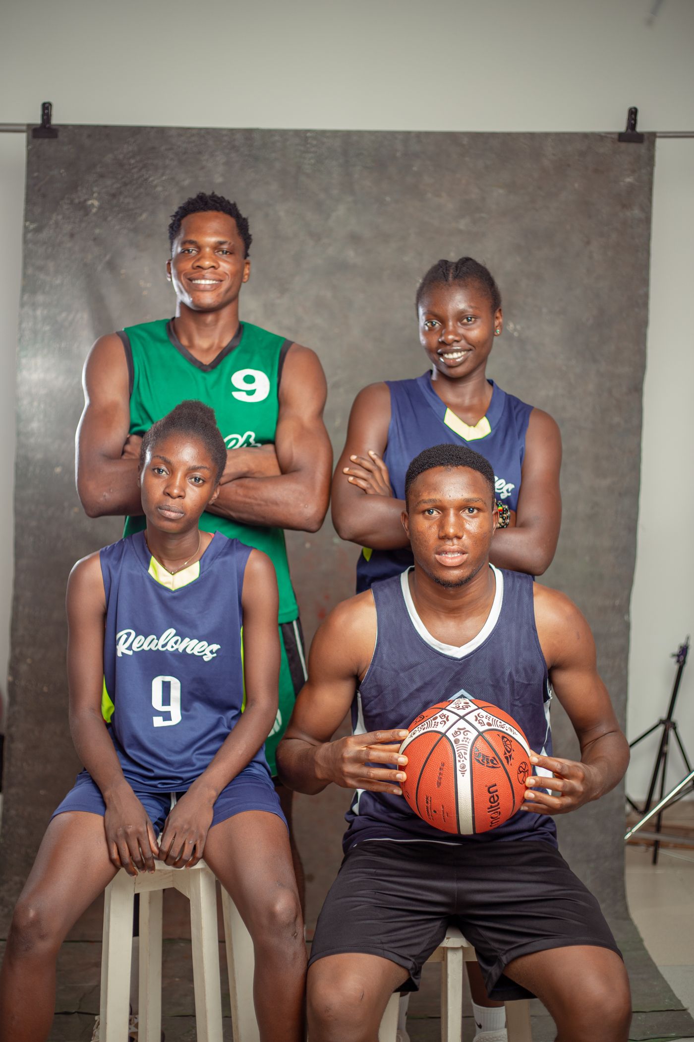 High school basketball players together after a game